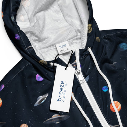 Windbreaker with pattern of UFOs and planets in space.