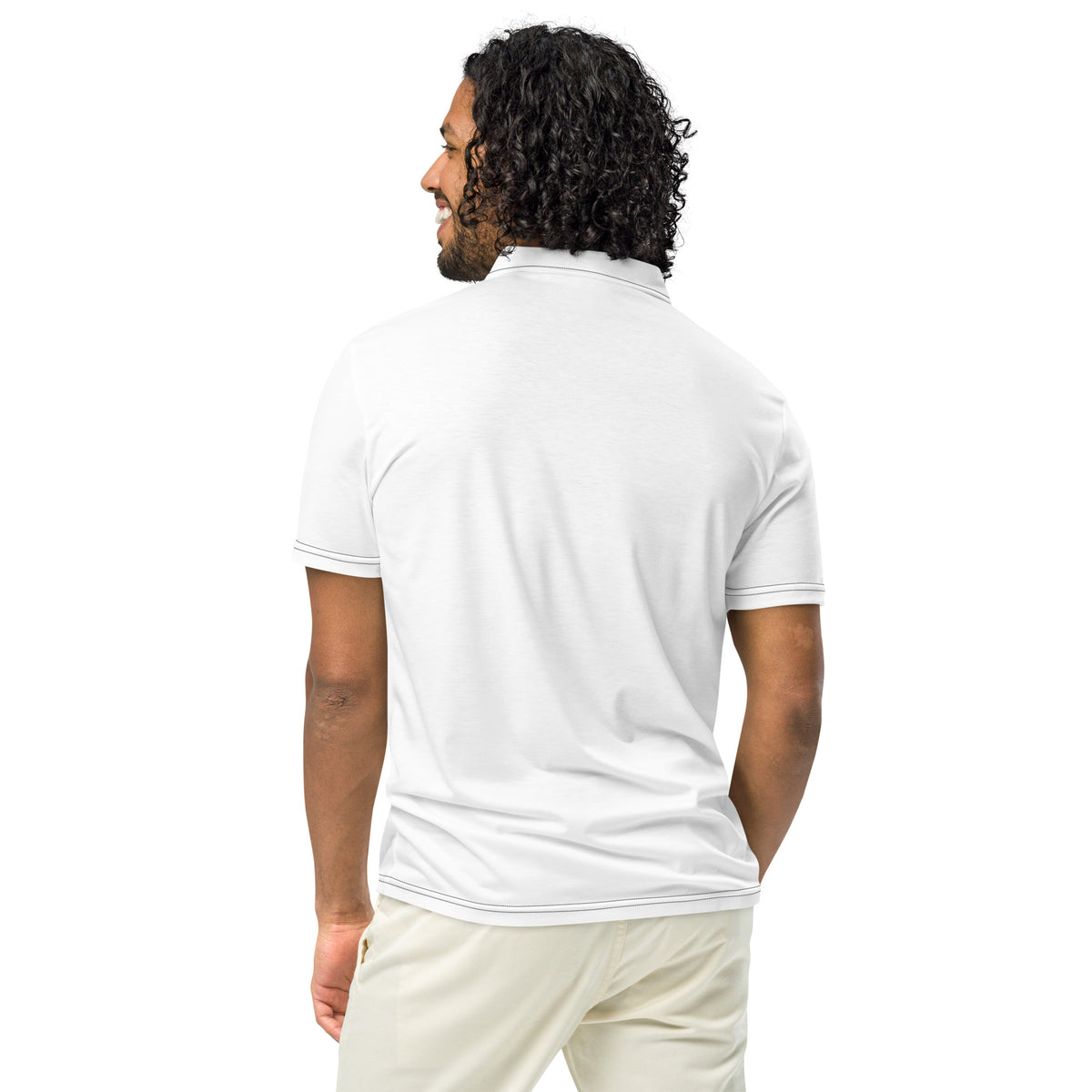 Rear view of man wearing white polo shirt