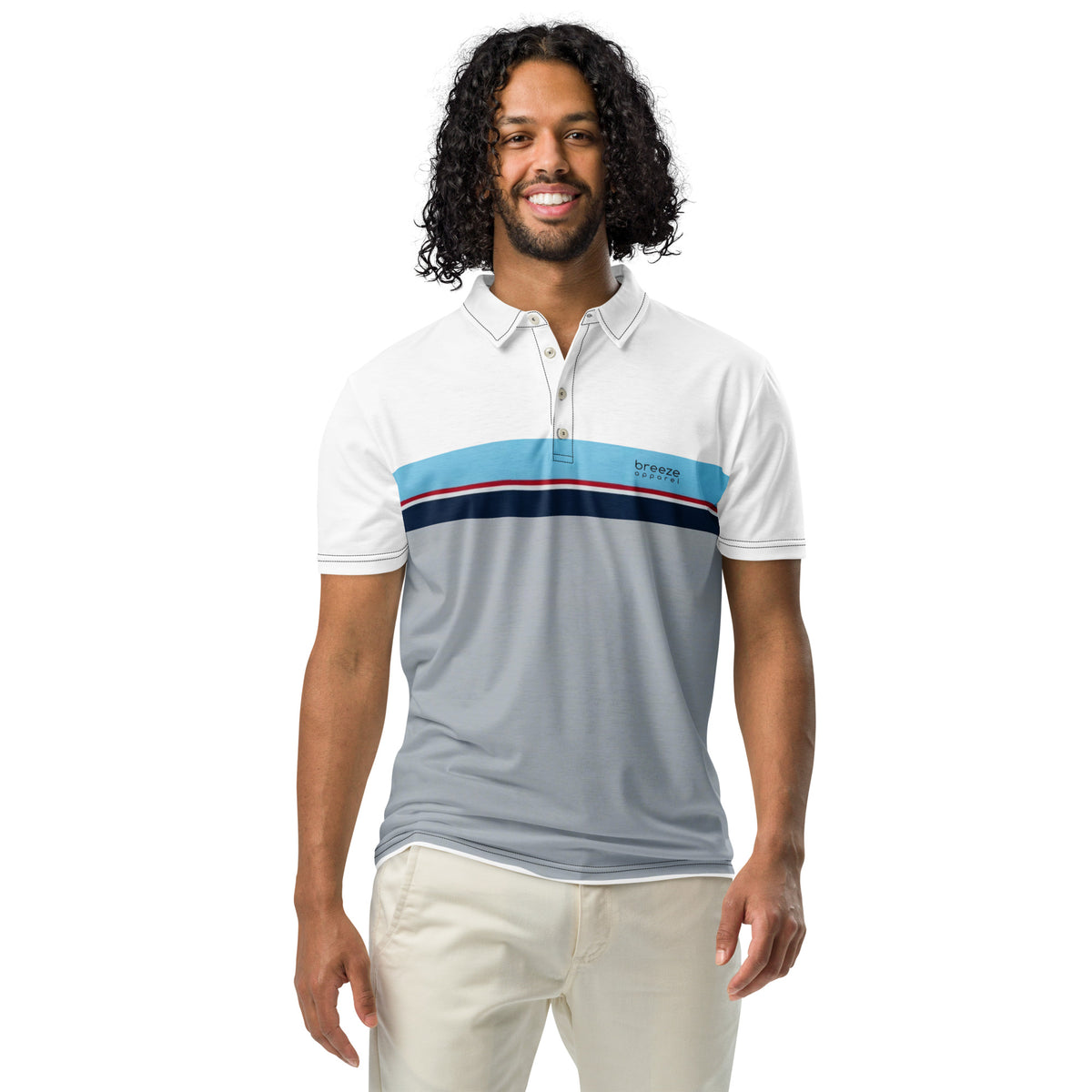 Man wearing polo shirt with horizontal blue, red, white, and navy stripe with small black 'breeze apparel' logo. Under the stripe until the bottom is gray.