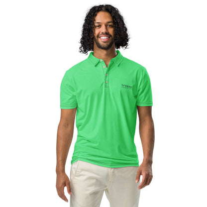 Man wearing green polo shirt with 'breeze apparel' in black over heart