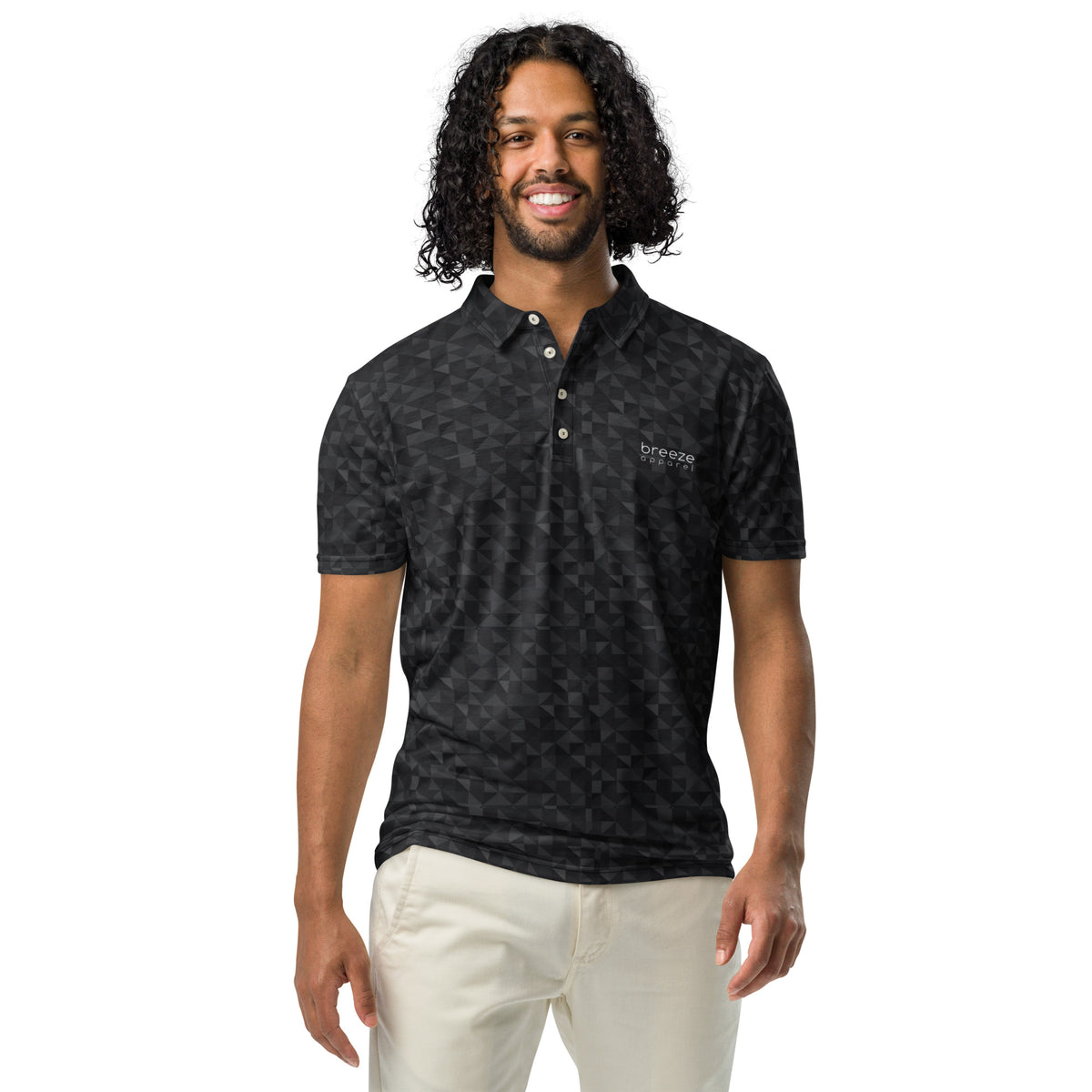 Man wearing polo shirt with dark-gray geometric pattern.