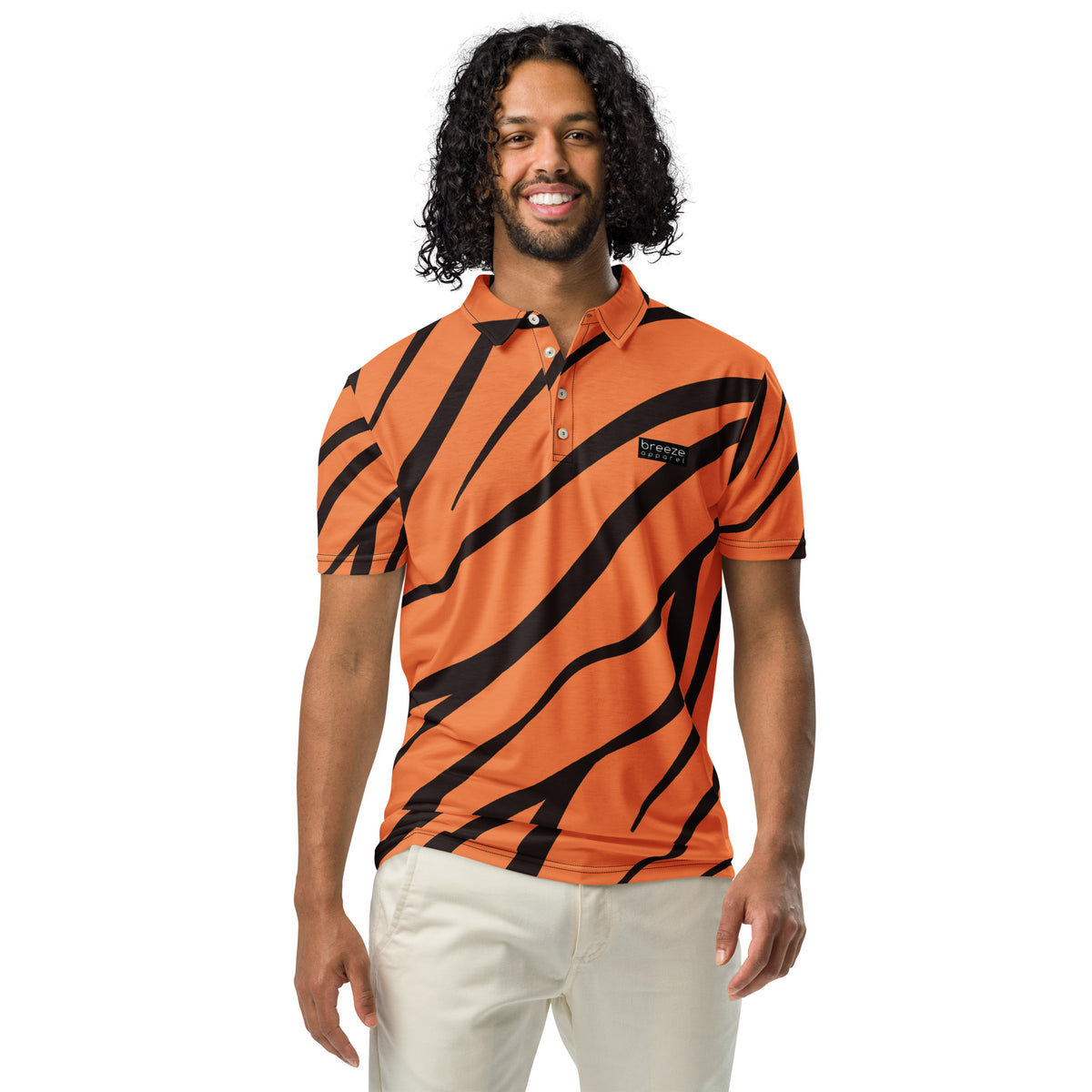 Man wearing polo shirt with tigerskin pattern.