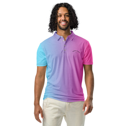 Man wearing polo shirt that fades from light blue to pink.