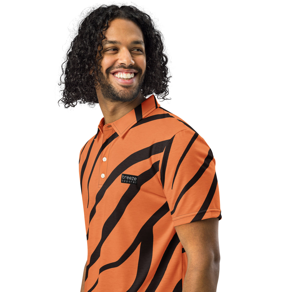 Man wearing polo shirt with tigerskin pattern.