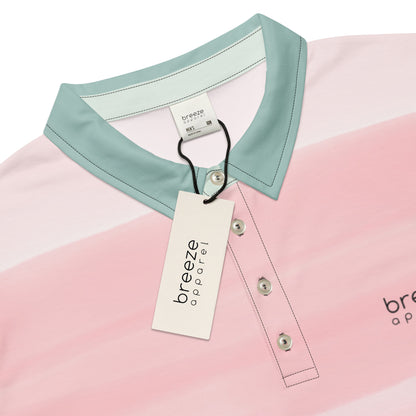 Polo shirt with design resembling watercolor stripes. Main colors are light-green and pink.