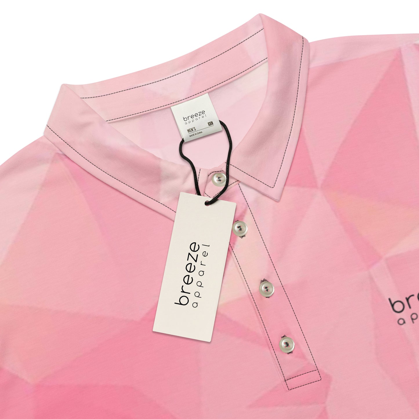 Polo shirt with pink geometric pattern.