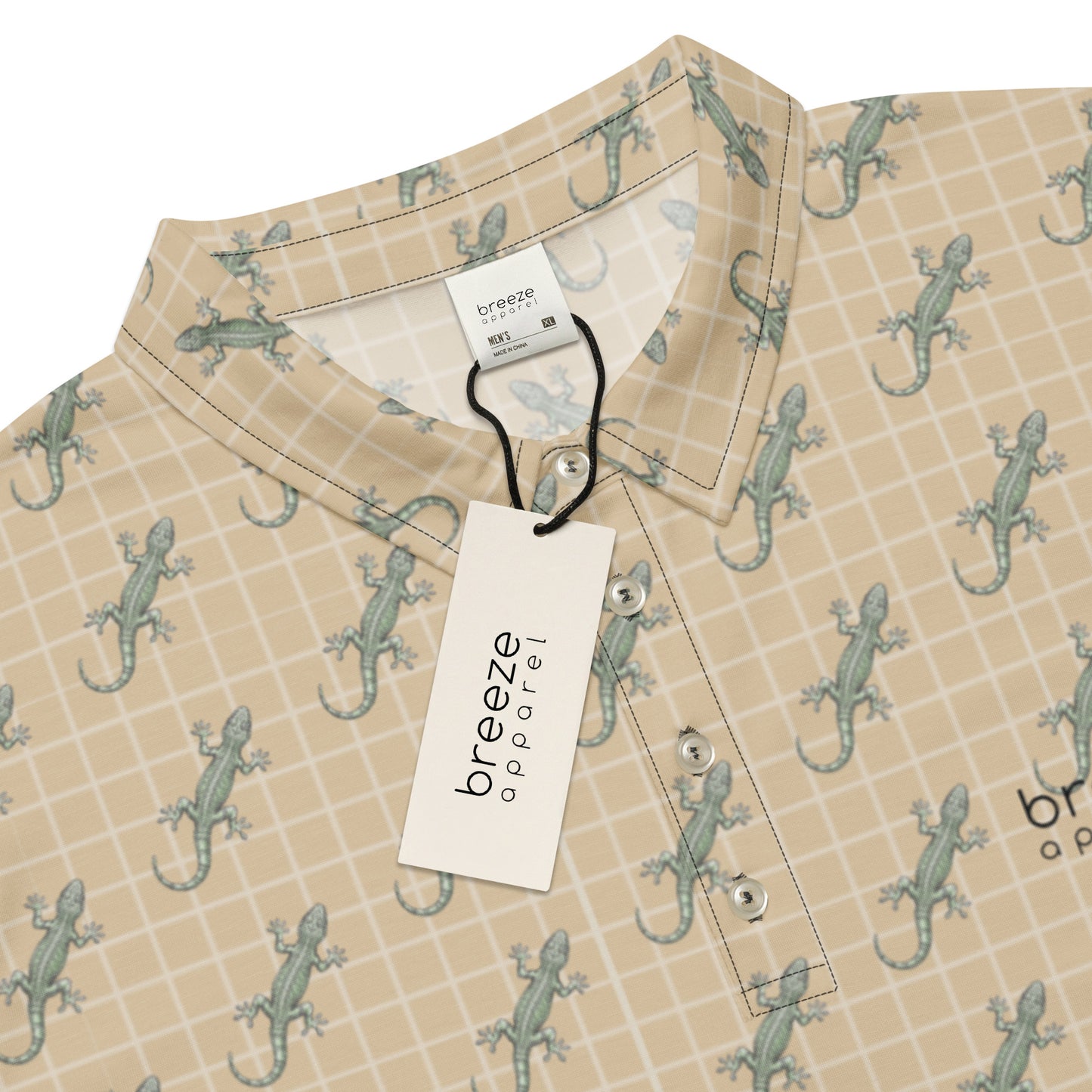 Beige polo shirt with pattern of green geckos.