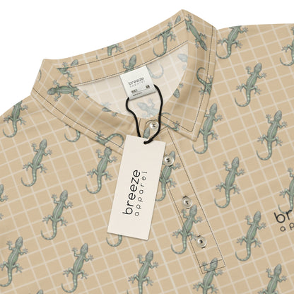 Beige polo shirt with pattern of green geckos.