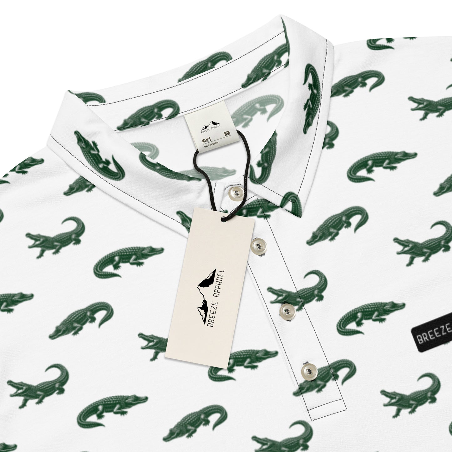 White polo with pattern of green alligators.