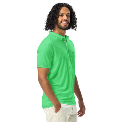 Man wearing green polo shirt with 'breeze apparel' in black over heart