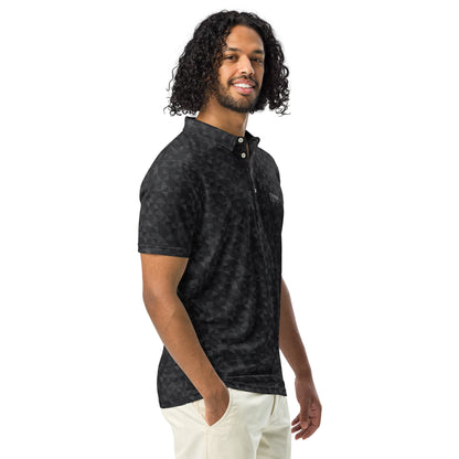 Man wearing polo shirt with dark-gray geometric pattern.