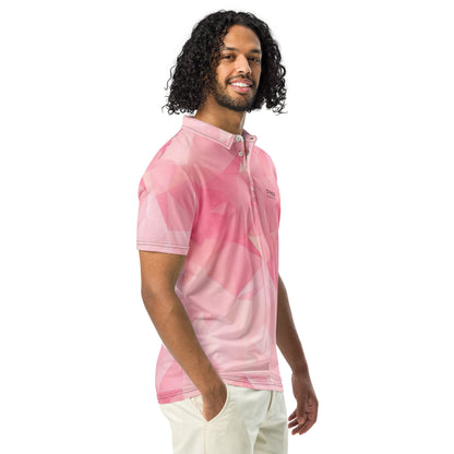 Man wearing polo shirt with pink geometric pattern.