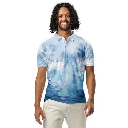 Man wearing polo shirt with blue watercolor design.