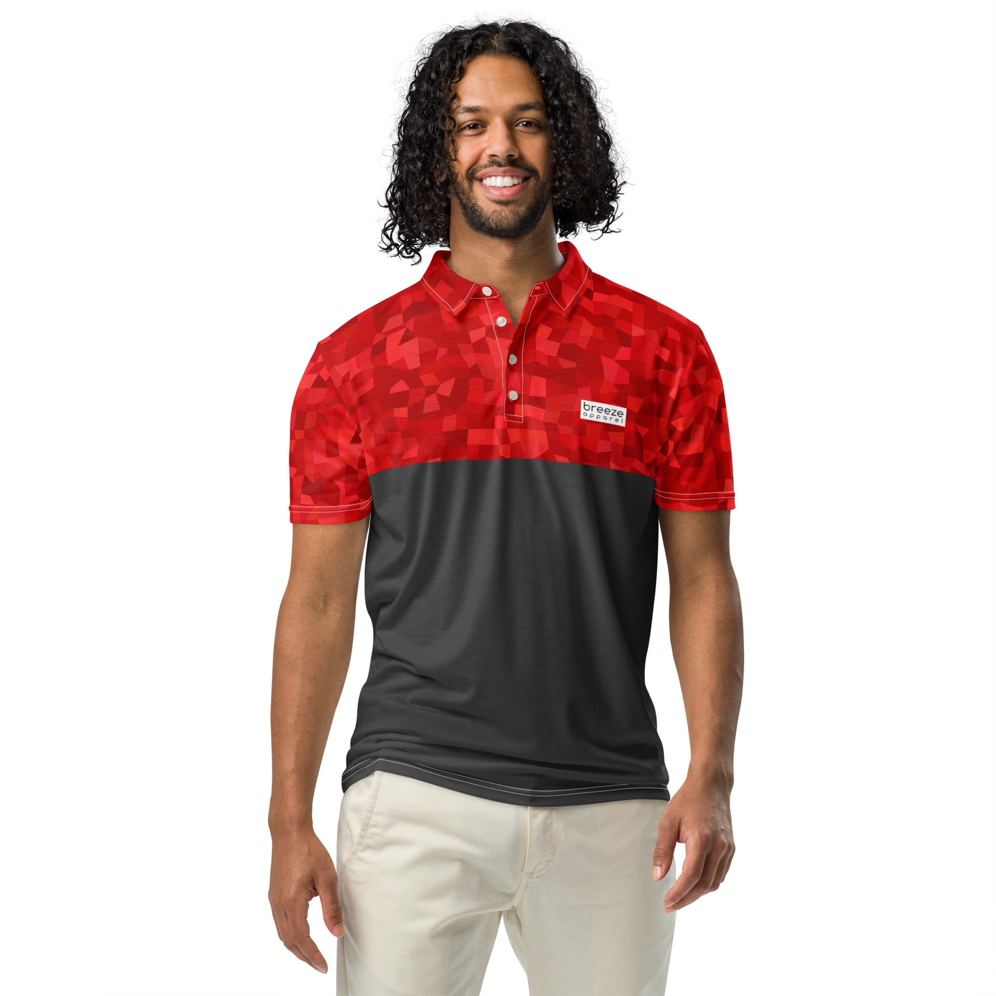 Man wearing polo shirt with red geometric pattern on top half and sleeves, with rest being dark gray.