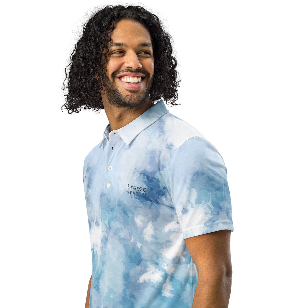 Man wearing polo shirt with blue watercolor design.