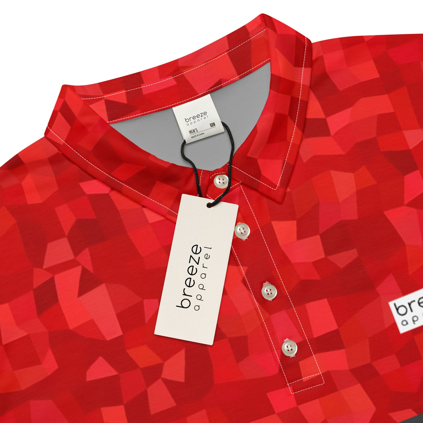 Polo shirt with red geometric pattern.