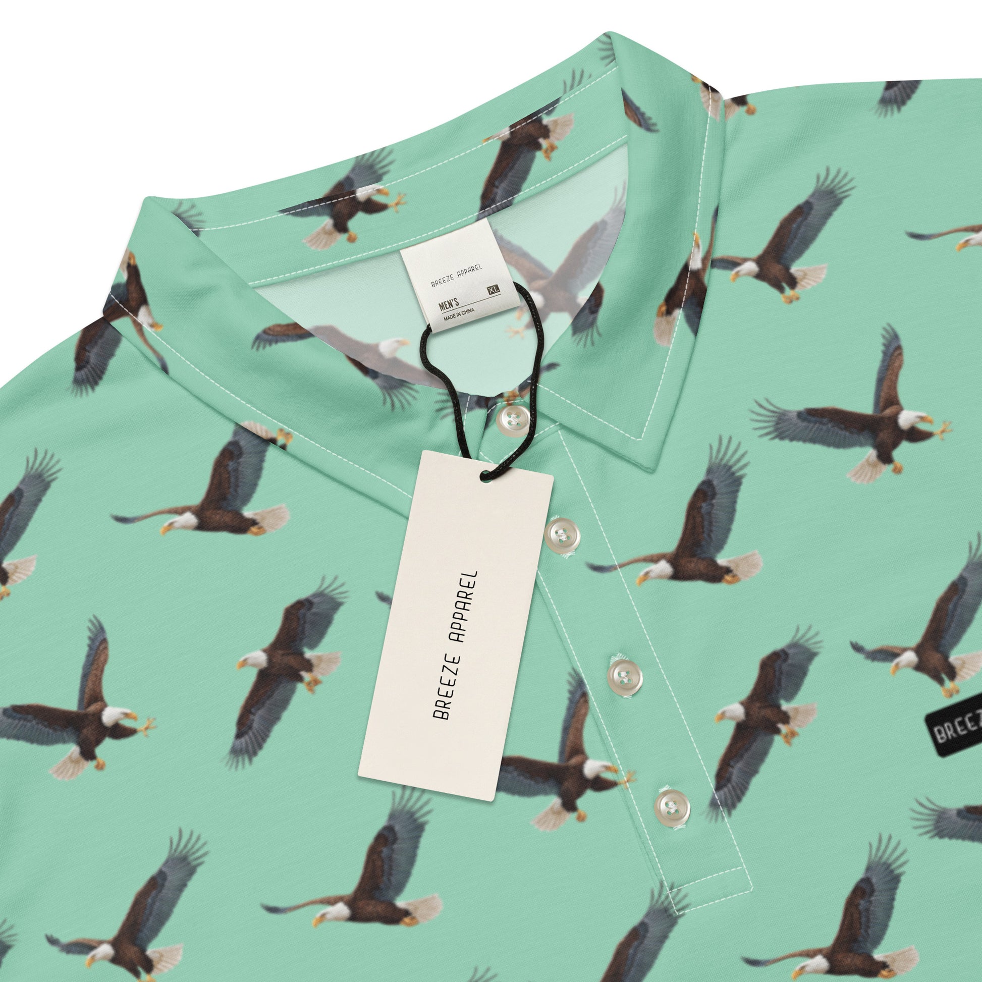 Green polo shirt with pattern of bald eagles.