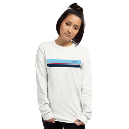 Woman wearing ash-gray long-sleeved shirt with horizontal blue, red, white, and navy stripe with small black 'breeze apparel' logo