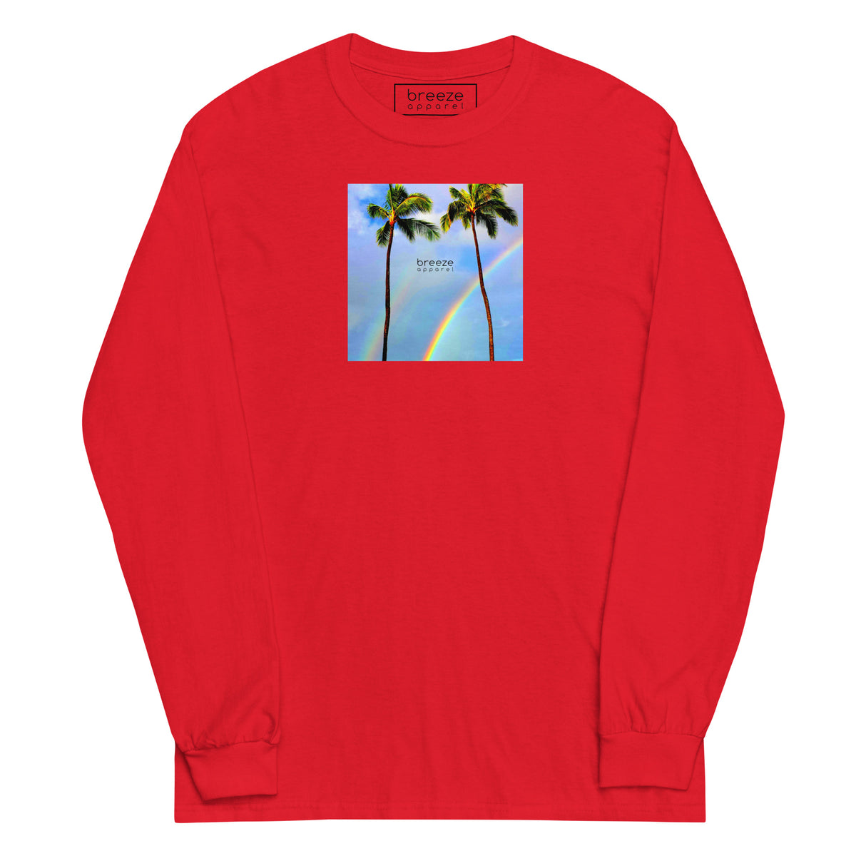 Red long-sleeved shirt with a graphic of palm trees, rainbow, and a clear blue sky in the background. A small, black 'breeze apparel' logo is between the trees.