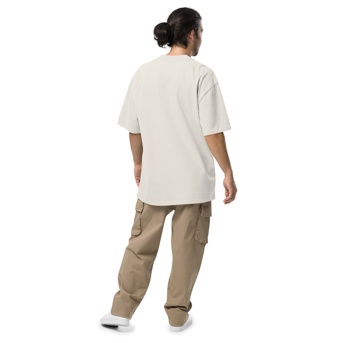 Rear view of man wearing white t-shirt.