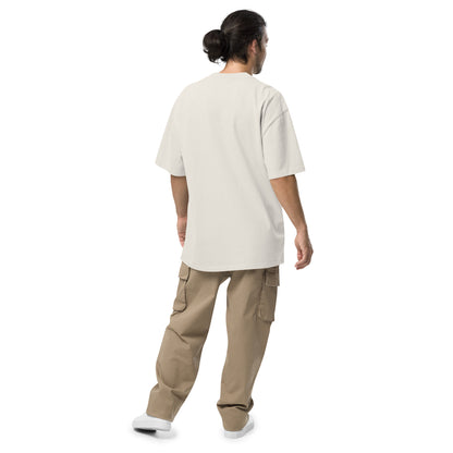 Rear view of man wearing white t-shirt.