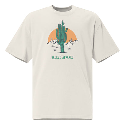 White t-shirt with graphic of cactus and sunset.