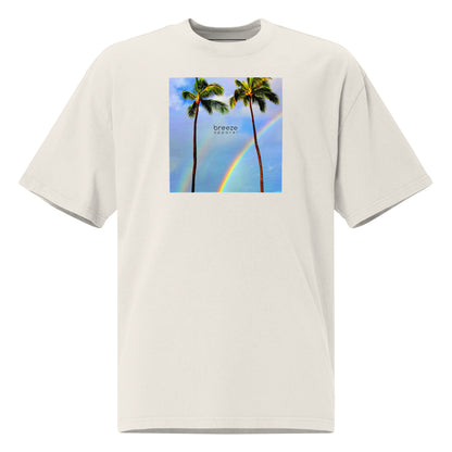 White t-shirt with graphic of two palm trees with rainbow in background.