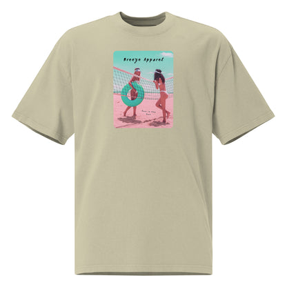 Green t-shirt with graphic of two women on the beach.