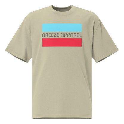 Green t-shirt with graphic of gray lettering between light-blue and red stripes.