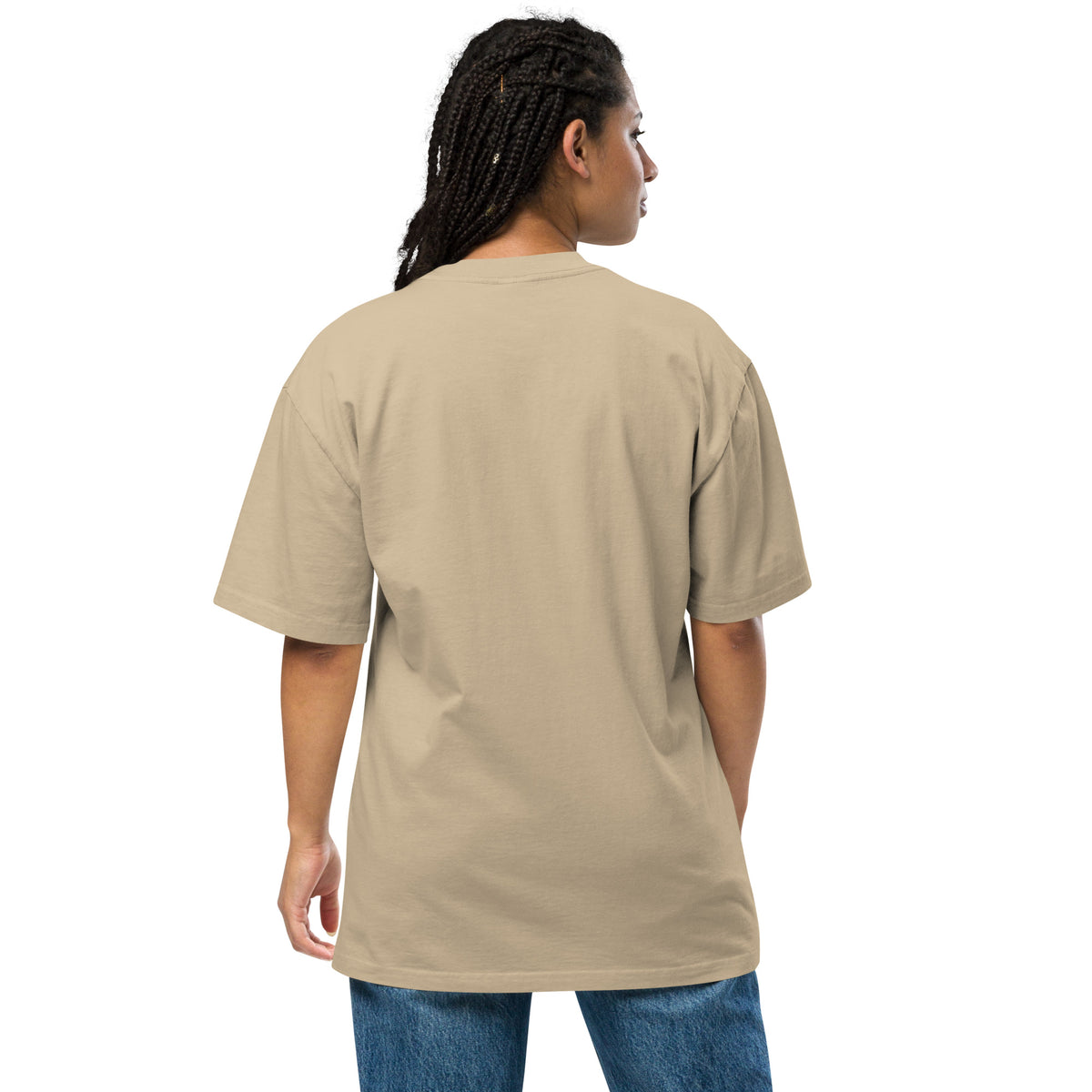 Rear view of woman wearing beige oversized t-shirt.