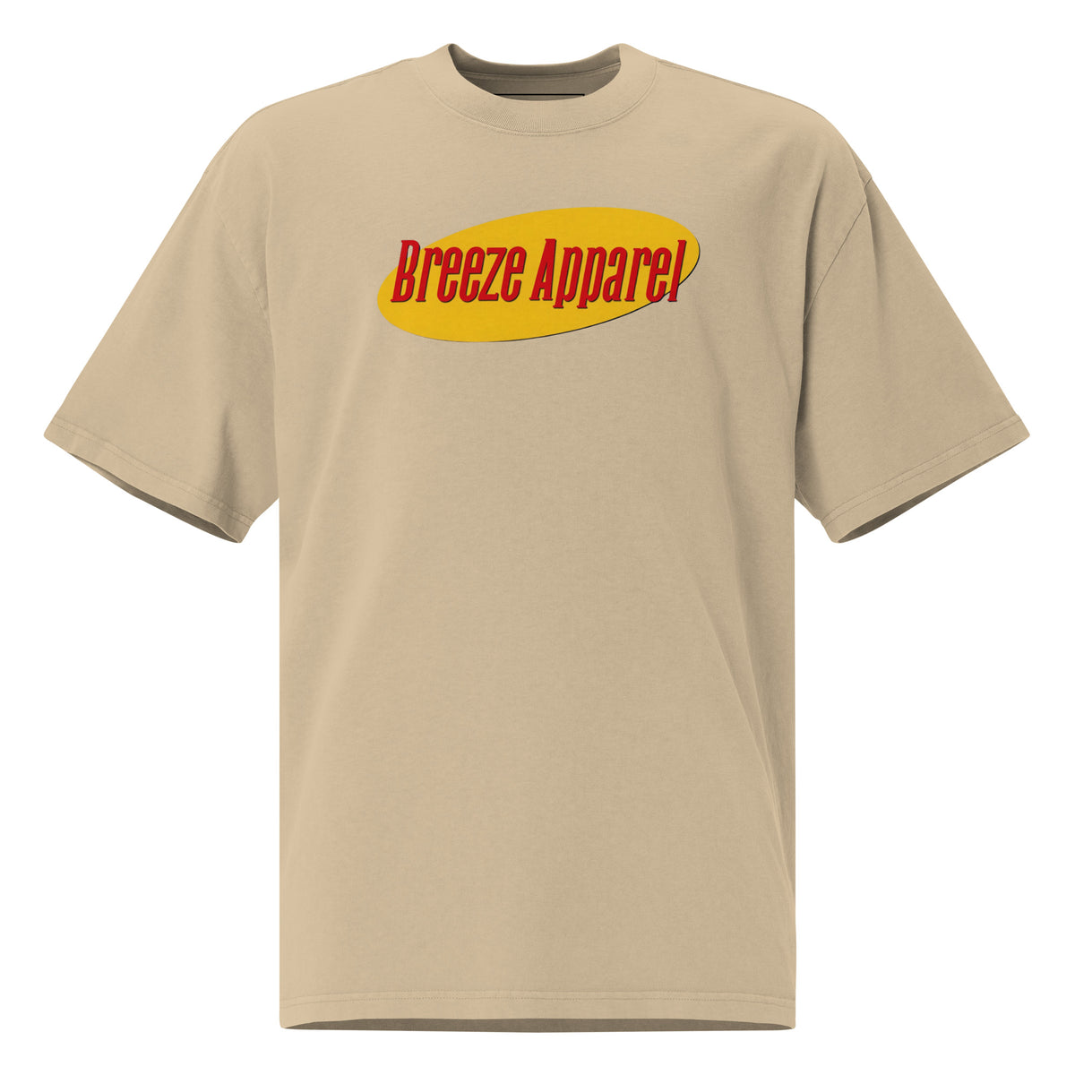 Tan t-shirt with graphic of red lettering set over yellow oval.