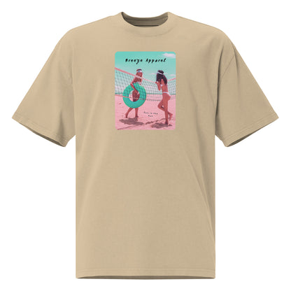 Tan t-shirt with graphic of two women on the beach.