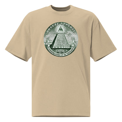 Beige t-shirt with graphic resembling pyramid on US one-dollar bill.