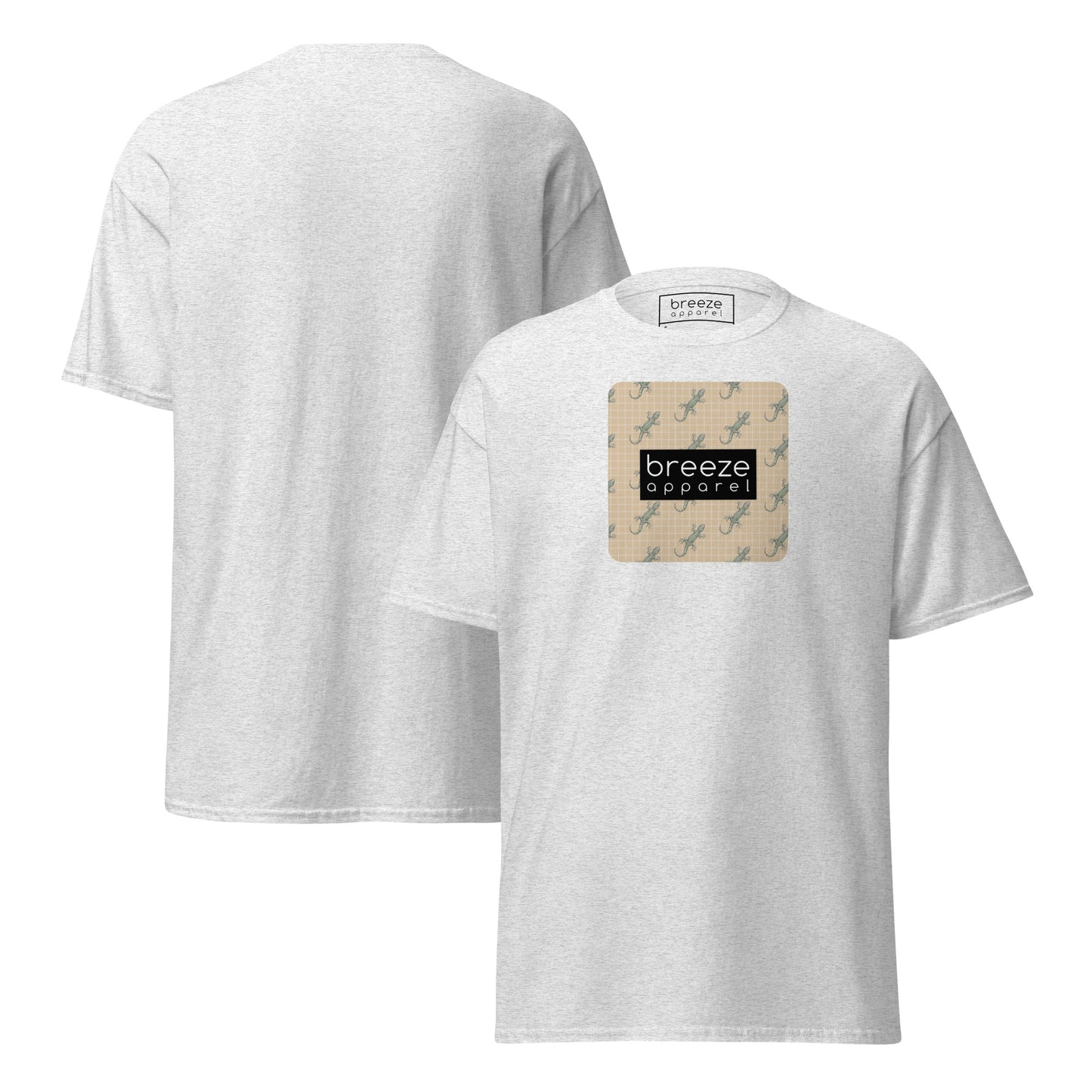 Light-gray t-shirt with square over chest that contains pattern of green geckos set on beige background, overlaid with black, rectangular logo with white lettering. Plain backside also shown.