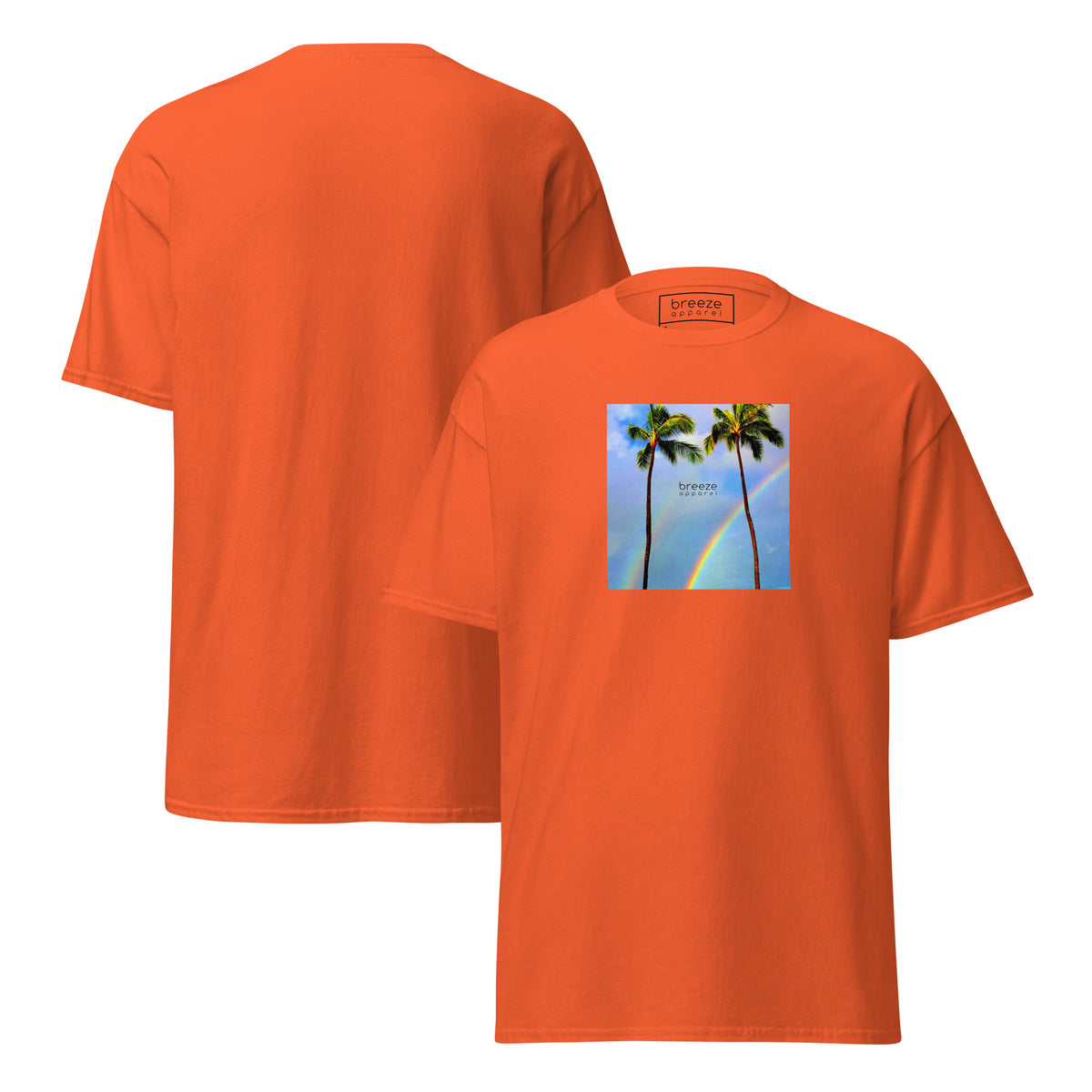 Orange t-shirt with a graphic of palm trees, rainbow, and a clear blue sky in the background. A small, black 'breeze apparel' logo is between the trees. Plain backside also shown.