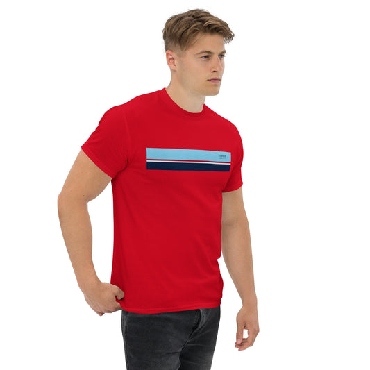 Man wearing red t-shirt with horizontal blue, red, white, and navy stripe with small black 'breeze apparel' logo.
