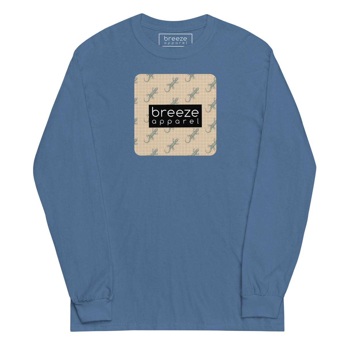 Blue, long-sleeved shirt with square over chest that contains pattern of green geckos set on beige background, overlaid with black, rectangular logo with white lettering.