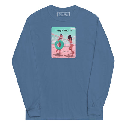 Blue long-sleeved shirt with colorful graphic of two women on the beach.