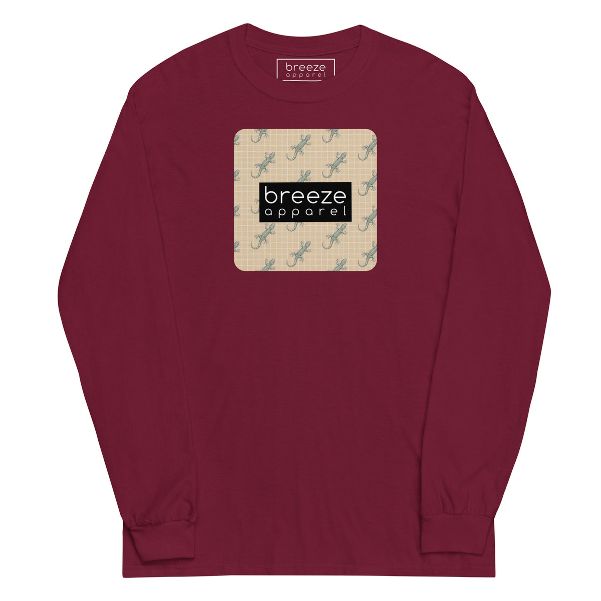 Maroon, long-sleeved shirt with square over chest that contains pattern of green geckos set on beige background, overlaid with black, rectangular logo with white lettering.