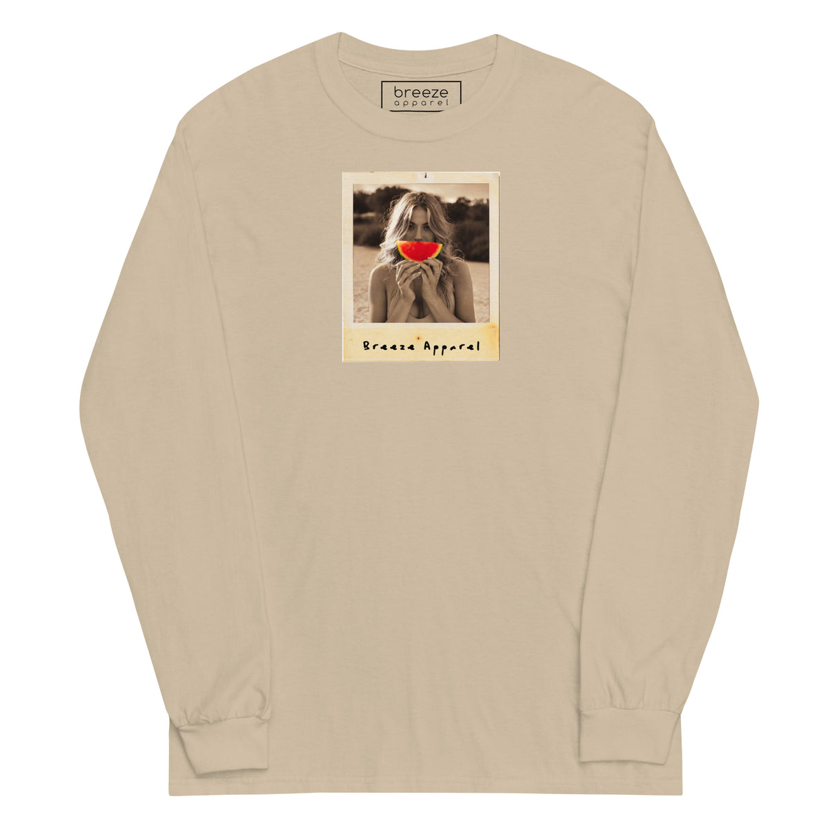 Beige long-sleeved shirt with graphic of woman holding a watermelon slice in front of her mouth.