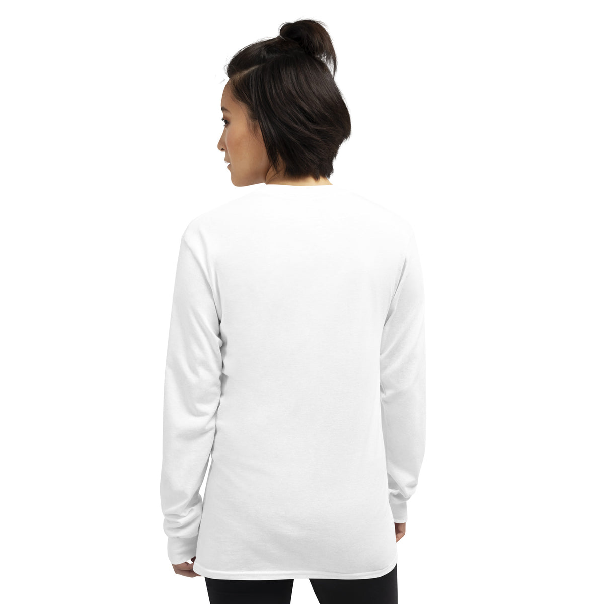Rear view of woman wearing white, long-sleeved shirt.