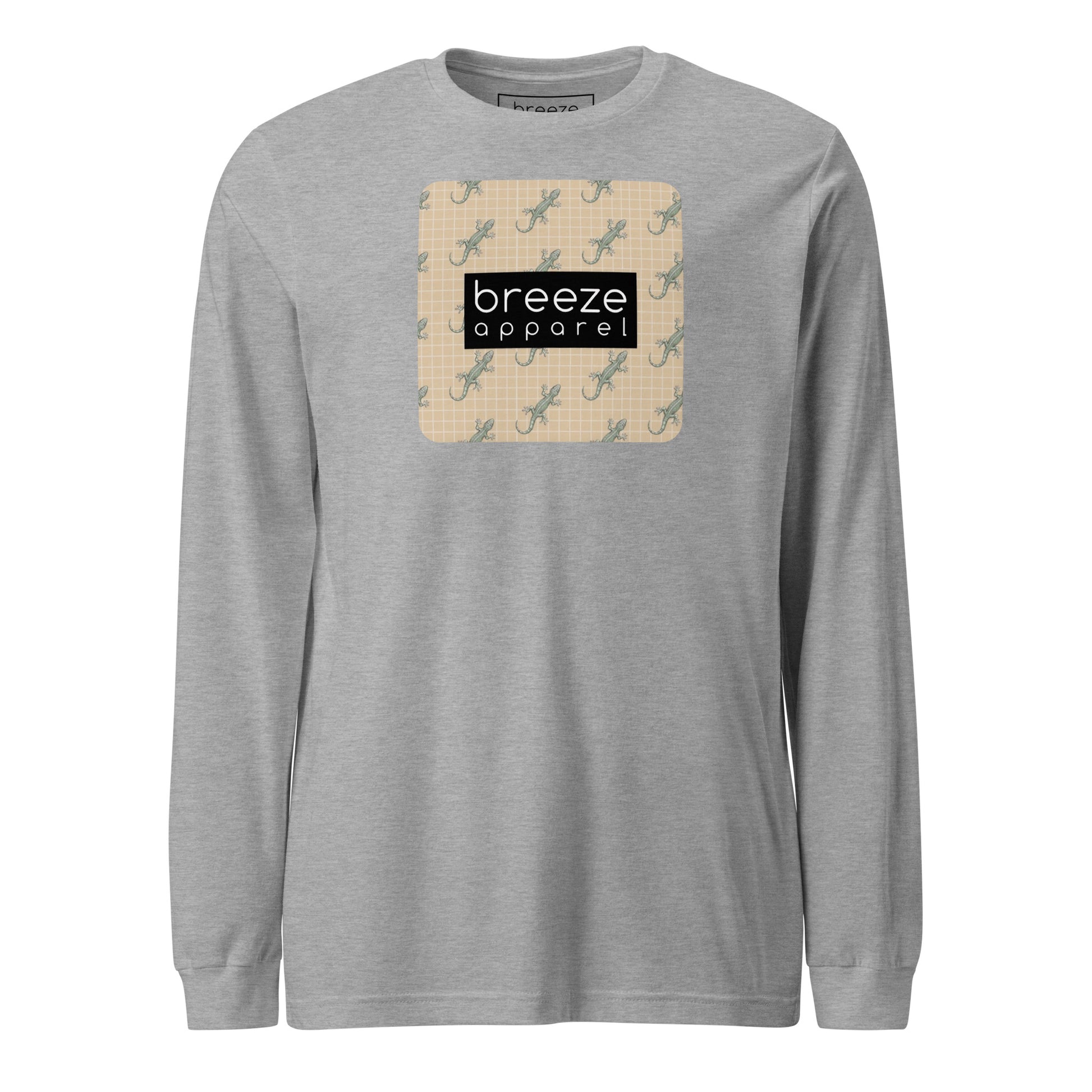 Gray, long-sleeved shirt with square over chest that contains pattern of green geckos set on beige background, overlaid with black, rectangular logo with white lettering.