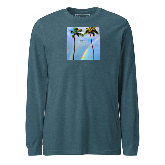 Heather-deep-teal long-sleeved shirt with a graphic of palm trees, rainbow, and a clear blue sky in the background. A small, black 'breeze apparel' logo is between the trees.