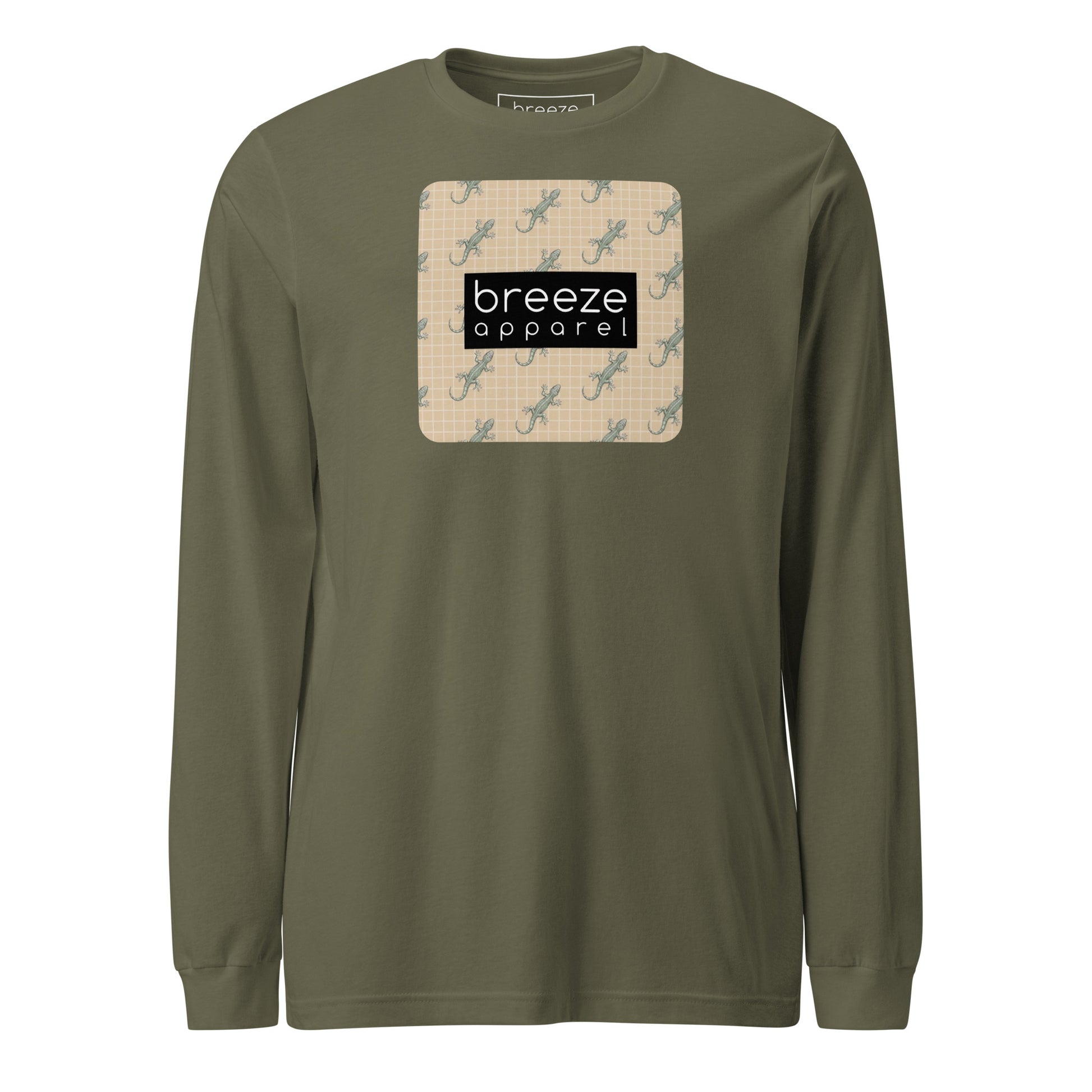 Green, long-sleeved shirt with square over chest that contains pattern of green geckos set on beige background, overlaid with black, rectangular logo with white lettering.