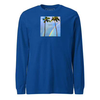 Royal-blue long-sleeved shirt with a graphic of palm trees, rainbow, and a clear blue sky in the background. A small, black 'breeze apparel' logo is between the trees.