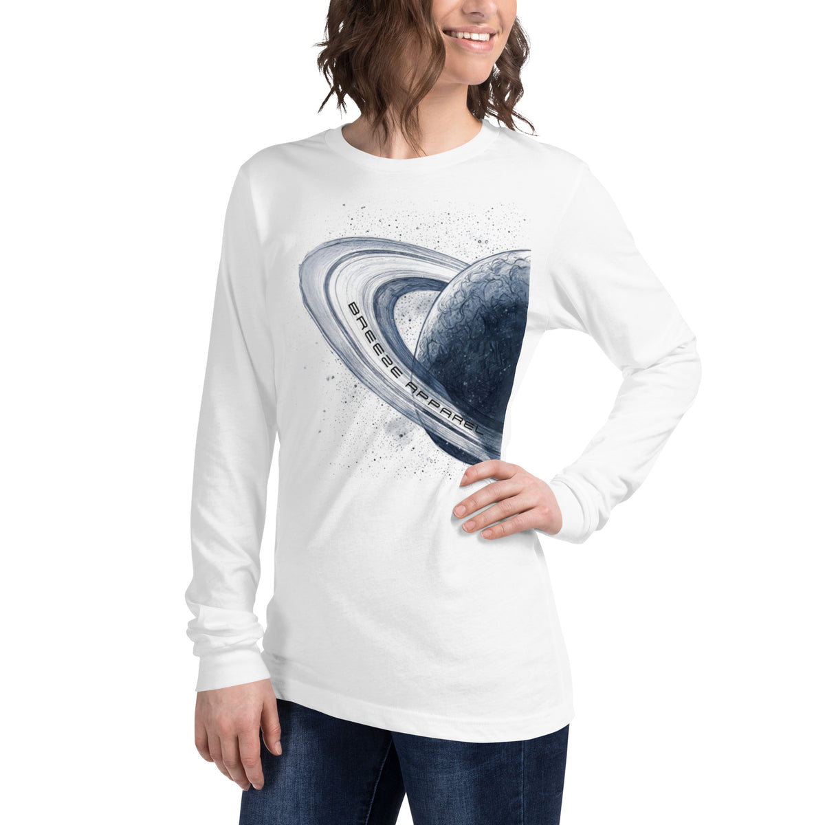 Woman wearing white, long-sleeved shirt with graphic of blue planet.