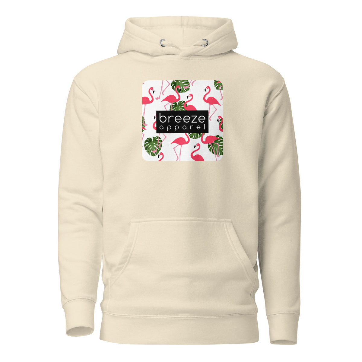 Beige hoodie with graphic of flamingos and green palm leaves set on a white background and overlaid with a black, rectangular logo.