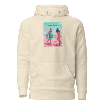 Beige hoodie with graphic of two women in bikinis on beach.