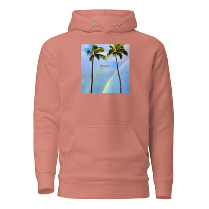 Pink hoodie with graphic of palm trees with rainbows in the background.
