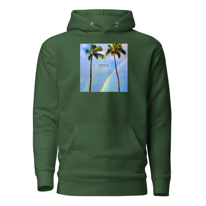 Green hoodie with graphic of palm trees with rainbows in the background.